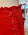Jupe short rouge avec des petits volants