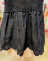 Petit top en crochet noir et fines bretelles