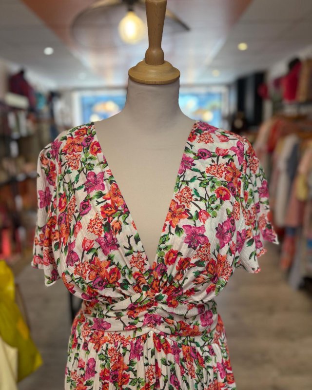 Longue robe écrue à motif fleuri