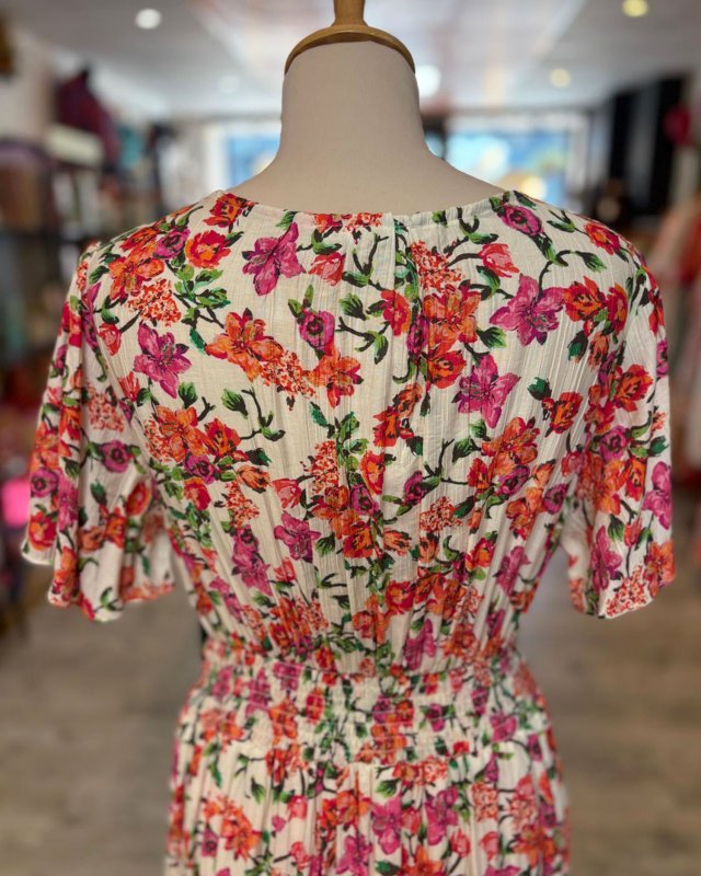 Longue robe écrue à motif fleuri