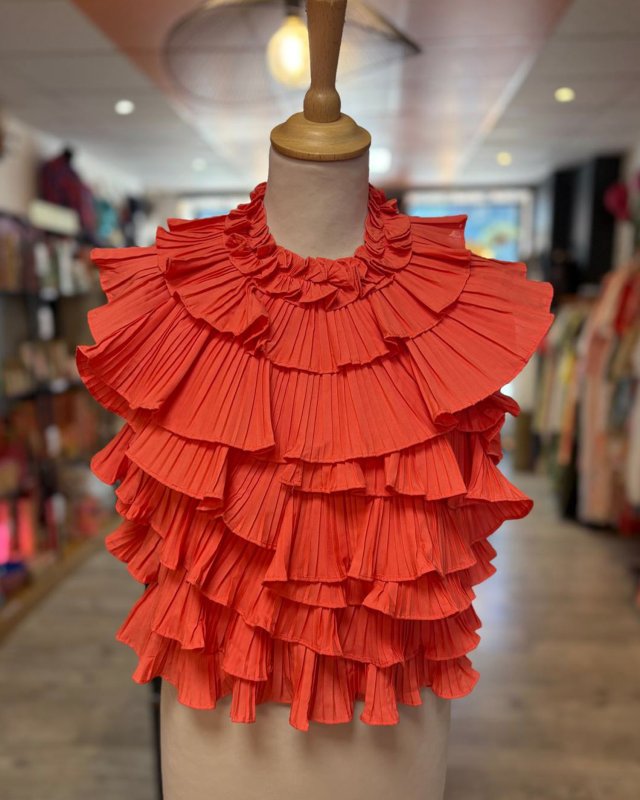 Top corail à volants plissés