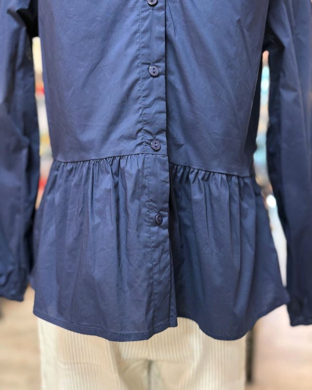 Blouse à basque bleu marine et grand col