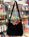 Sac à main en cuir nubuck et anneaux dorés